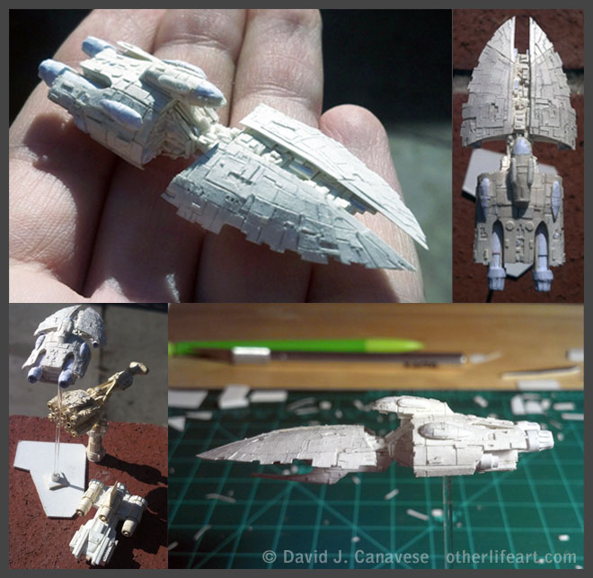 A ship with a claw-like forward section, a dome-shaped aft section, a slanting spar connecting the two, and a bridge pod that extends from the aft section partway over the spar. One view shows the model sitting in my hand for scale (about as long as my hand is wide). Another shows three of my other paper ship models for scale.